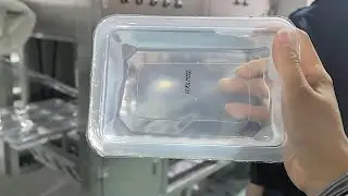 Boxes trays filling and sealing machine for packing liquid in cups
