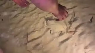 Catching flounder fish with bare hands