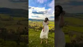 Young Girl ln Vintage White Dress  Windy Skirt In Field