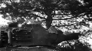 United States M4 medium tank and M8 HMC are fired by US Troops in France. HD Stock Footage