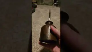 Antique oil can