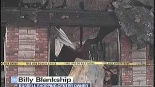 Fire destroys shopping center