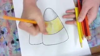 How to draw candy corn using value and blending colored pencils.