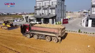 Great work! Filling up land processing Dump truck with Dozer SHANTUI Push soil into water clear land