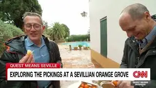 Richard Quest picks oranges in Seville
