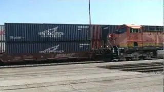 BNSF 7720 meets a manifest at San Bernardino, CA