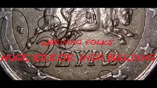 Huge leg chip 2 Euro coin error from Greece 2002 with 
