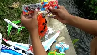 Pick up different Airplane Toy from the gutter