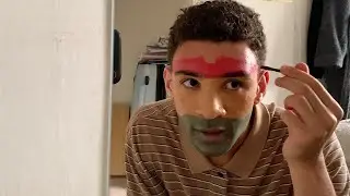 giving myself horrible face paint