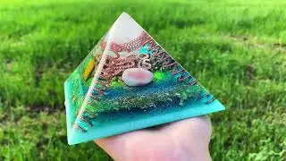 Orgonite Pyramid   Crystal Quartz, Snowflake obsidian, Apricot agate, Tiger&rsquo;s Eye, Rose Quartz