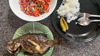 My Filipino breakfast, head-on fish, rice, dipping sauce