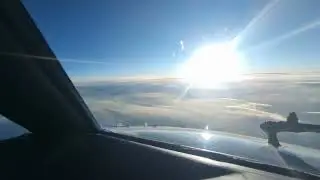 Sun rising seen from 35000ft on shortest day of the year 21 December.