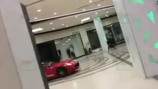 Driving a car in mall