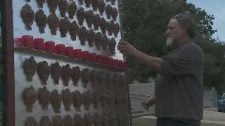 Artist honors lives lost to violence at annual City Hall memorial