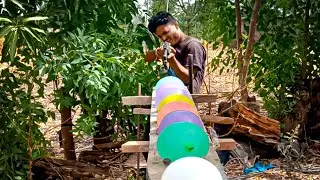air gun power test with air & water bollons || पानी और हवा से भरे गुब्बारों पर चलाई बंदूक,air gun