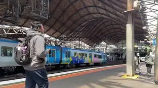 Graffiti X'trapolis leaving Southern Cross station