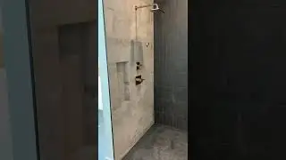 Beautiful Black and Grey Custom Shower with Gold Accents
