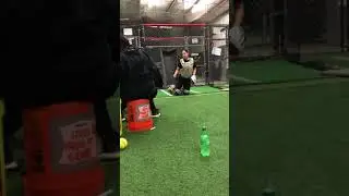 Kayla&rsquo;s catching lessons with coach Martin