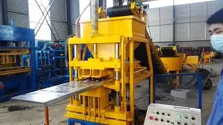automatic red soil interlock brick machine exported to America .
