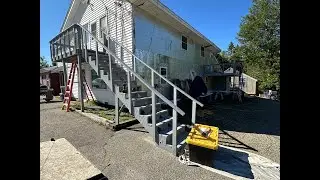 Installing mesh guard on deck rails, reflectors & house #'s. Painting shed after decks are finished!