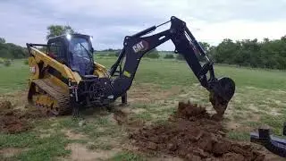 Cat&reg; BH130 Backhoe Smart Attachment at Work