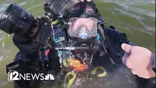 Divers able to recover wedding photos after photographer falls into lake