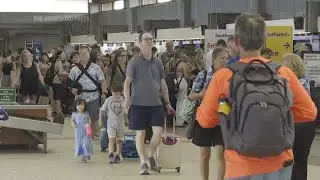 Tourists depart as Maui is scorched by wildfire