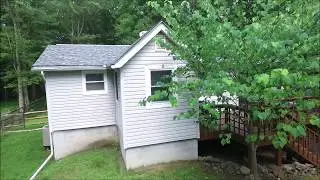 Grassy Fenced-In Backyard for this Raised Ranch