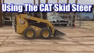 Использование мини-погрузчика CAT для выравнивания грунта