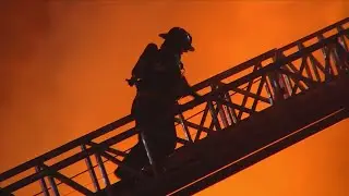 Firefighters still at the scene of storage facility that caught fire Sunday night
