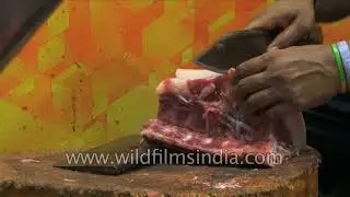 Different cuts of fresh pork meat at INA market, South Delhi