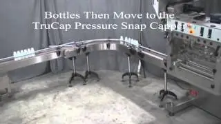 Bottle Unscrambler, Pressure Overflow Liquid Filler & Inline Screw Capper, by Acasi Machinery