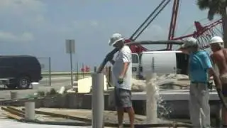 Filling TuffDock pilings with concrete at Parrish Park
