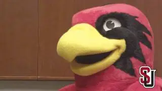 Coach Dollar learns about Rudy's Kids Club