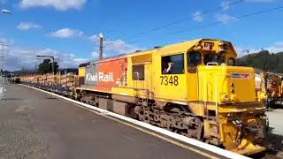 649 log train southbound with Dfb 7348 in charge