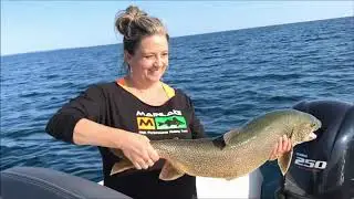 Vertical Jigging Lake Trout with a surprise Steelhead on Grand Traverse Bay