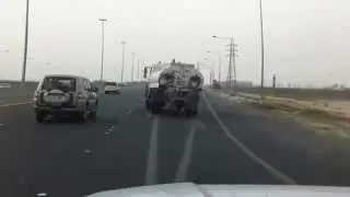Water tanker on the road while its wheel alignment is out, kuwaitup2date.com