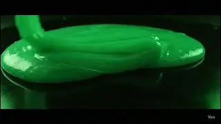 Liquid glowing slime on a dark table, cinematic, relaxing, 8K