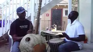 Alfusainey Suso and Babacar Mbengue playing kora and djembe in San Diego