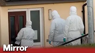 Forensic at scene as three arrested in murder investigation