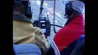 Landscape views of a Himalayan hill station from a helicopter cockpit