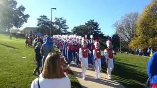KU Band marching down the hill