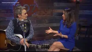 A song writing legend with a guitar