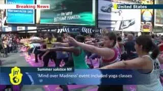 NYC yoga enthusiasts take over Time Square for 2013 Summer Solstice celebration