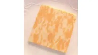 A Photo of Colby Jack Cheese That Is Orange and White