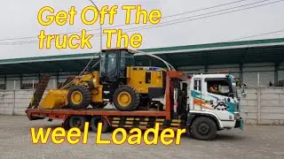 Wheel Loader Unloading from the low bed (truck)    #Romanianjayaa