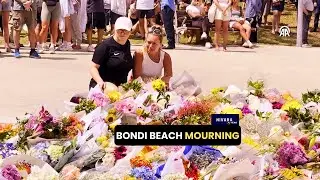 Flowers cover Bondi Beach memorial after deadly Sydney shooting