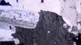Orthoclase in granite (XPL)