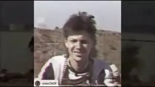 Pseudo Echo's Brian Canham & James Leigh looking at motorbikes (1986?)