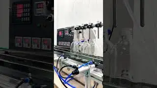 Small four-head liquid filling machine for blended wine #fillingmachine